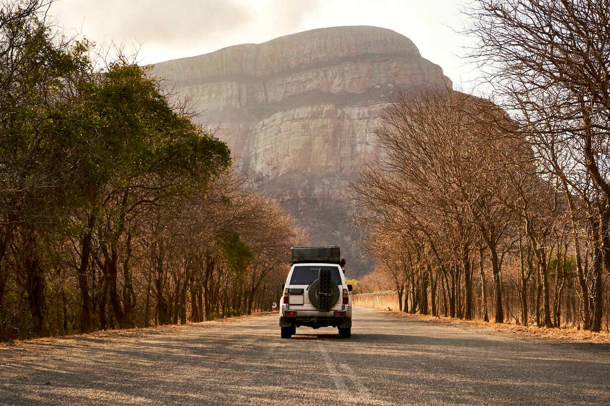 4x4-on-a-country-road-with-a-mountain-in-background-limpopo-south-africa